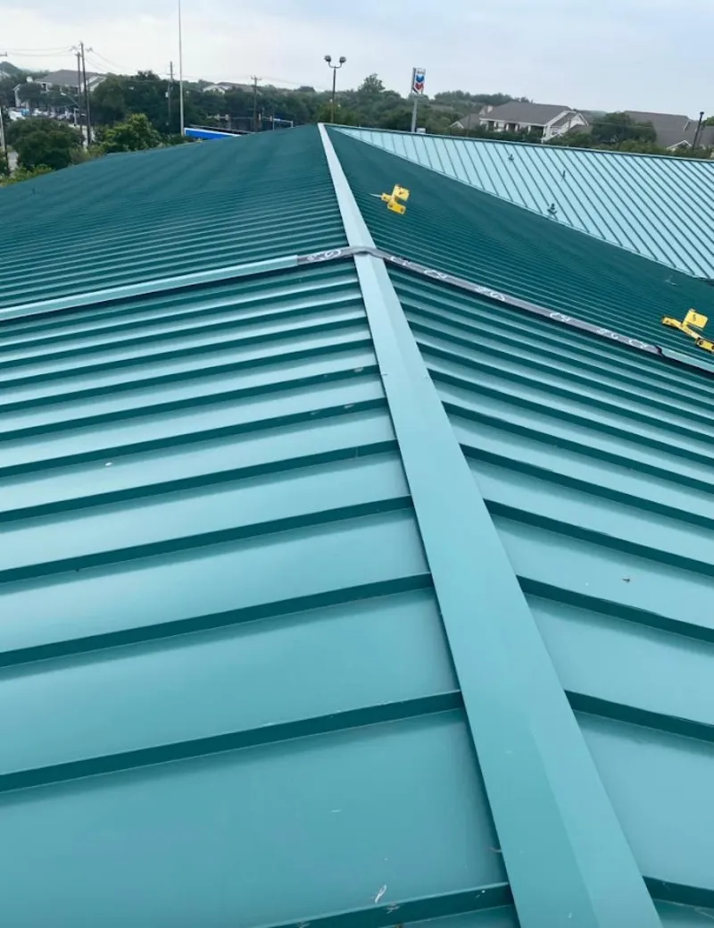 Green commercial metal roof ridge and valley for Metal Roof Repair in Lakeland Highlands